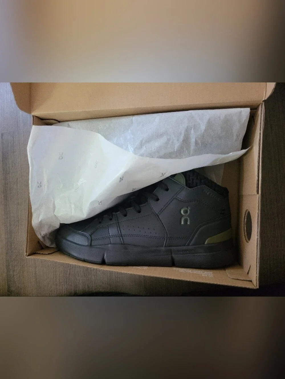 On Running Black High-Top Athletic Shoes with Olive Accents